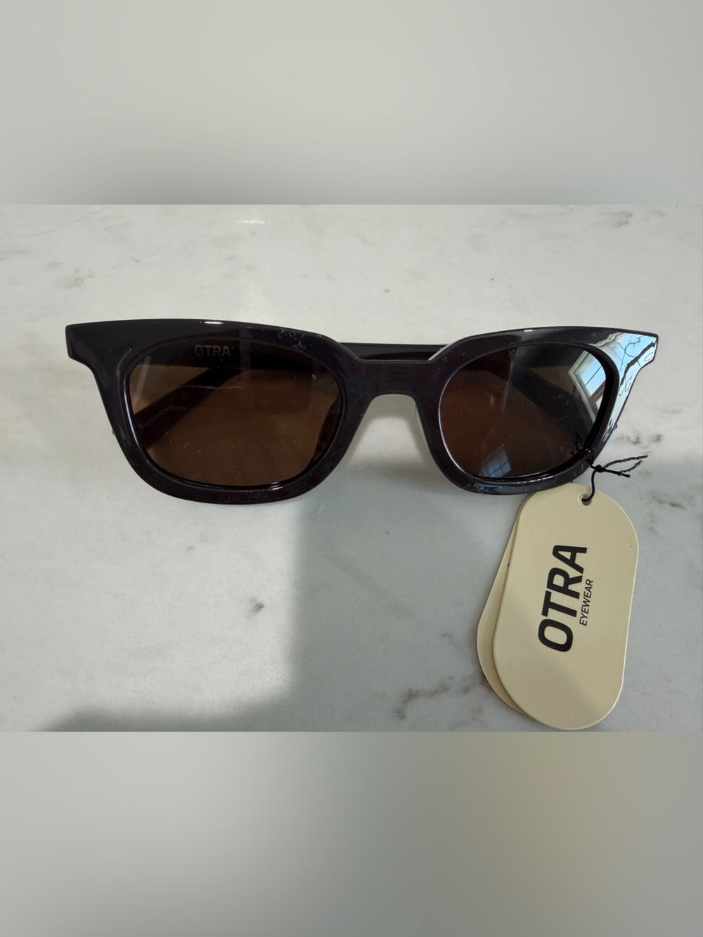 OTRA Black Frame Sunglasses with Brown Lenses